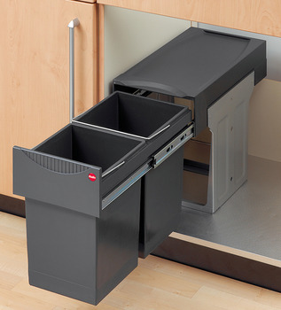 Hand Pull Out Bins Behind The Door