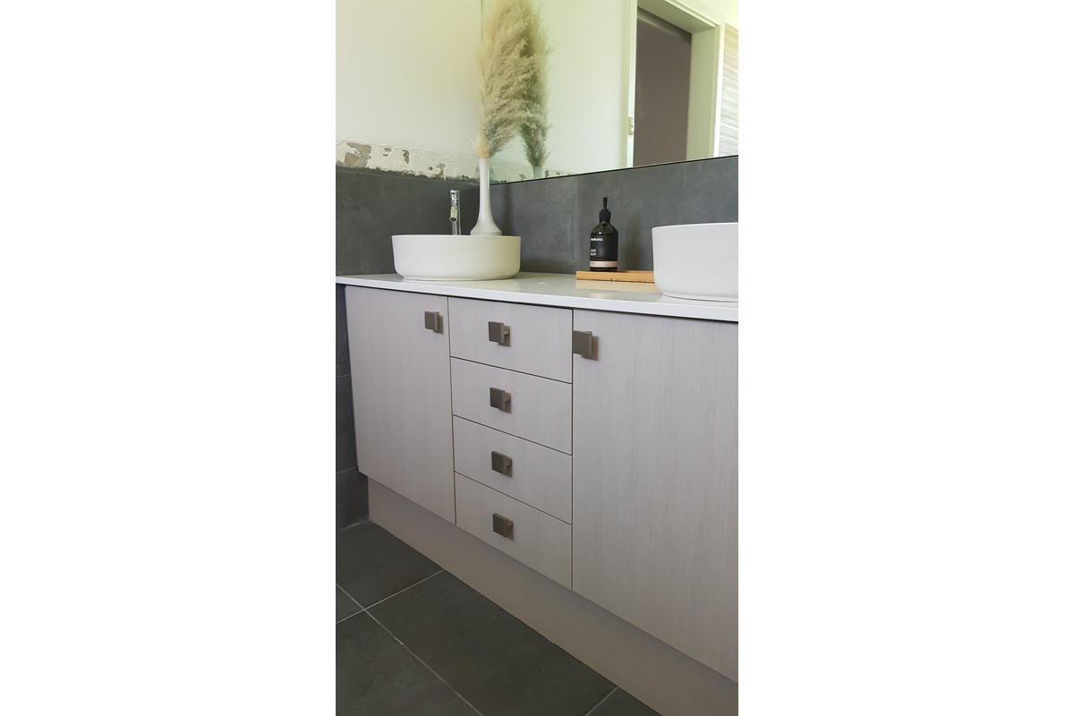 Vanity with laminated doors